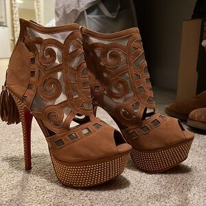 High heels, light brown/tan. Liliana. Soles red because I painted them.